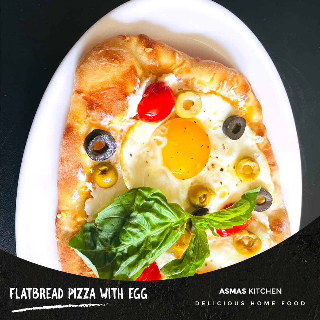 Flatbread pizza with egg photo