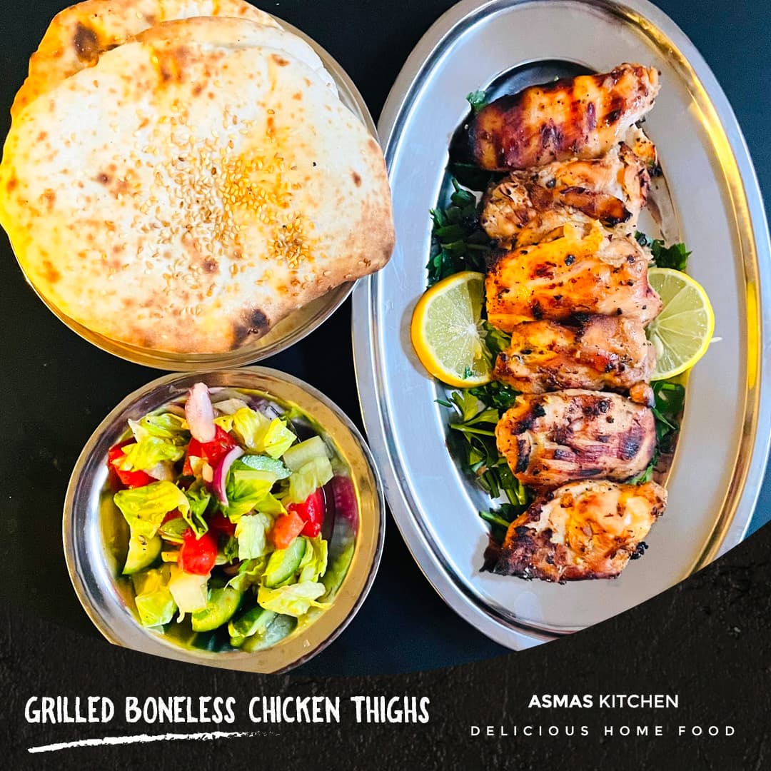 Grilled boneless chicken thighs photo